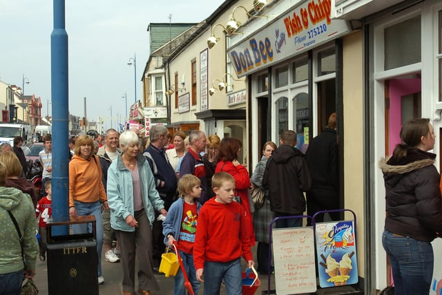 Fish and chips are in high demand in this scene from 12 years ago.