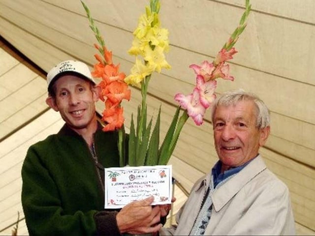 Sutton allotment holders William John Bellamy and his father Maurice  winning second prize in the Gladioli any variety and the Grown In Ashfield certificate in 2006.