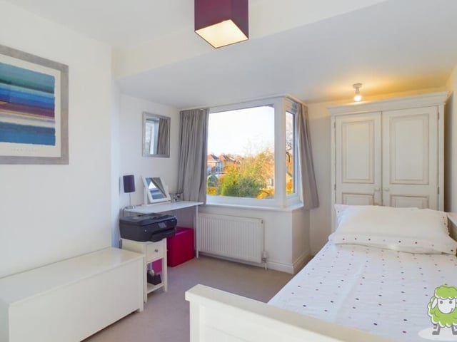 The third bedroom on the first floor, which overlooks the front of the house, is a good size, with space for wardrobes and storage.