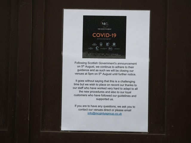 A sign at The Grill notifying customers of its closure. Picture: Andrew Milligan/PA Wire