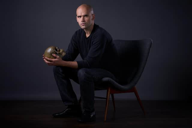 Ralph Davis plays the lead role in Hamlet