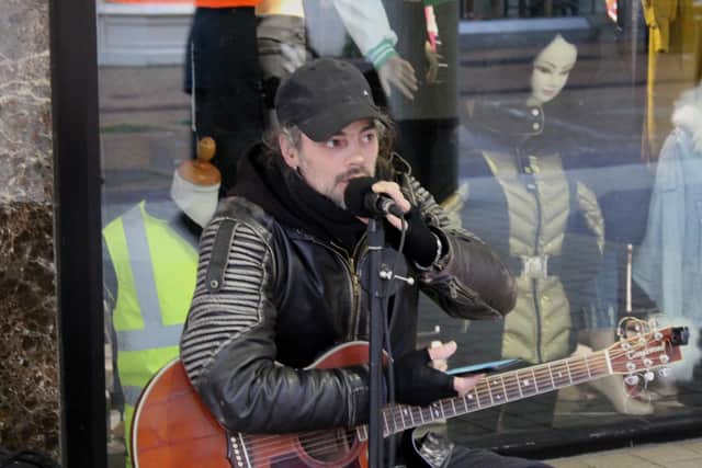 Wes Dolan performing in Mansfield town centre.