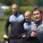 Mansfield Town boss Nigel Clough dishes out the instructions on the first day of pre-season training.