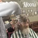Kevin had his hair and beard shaved at Moon's Barber Shop, Mansfield.