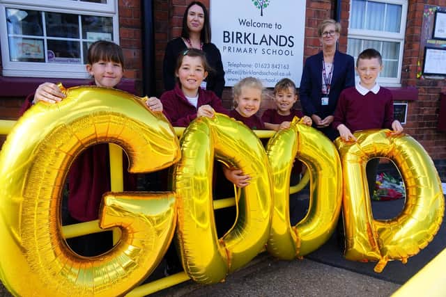 Head teacher Vanessa Farr and children celebrate the Ofsted award of a 'Good' rating for Birklands Primary School in Warsop last year.