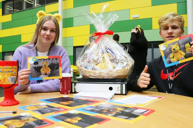 Business studies students Linda Kiselova and Morgan Rushforth with one of the prize competitions