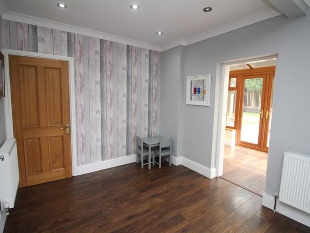 Although the conservatory is currently used for family meals, this space, which is part of the kitchen, could also be turned into a dining area.