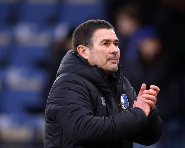 Nigel Clough acknowledges the fans following the teams victory in the Emirates FA Cup Fourth Round match between Burnley and Mansfield Town (Photo by George Wood/Getty Images)