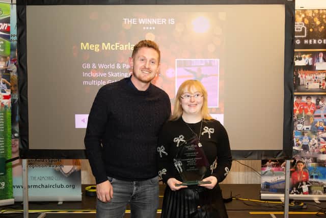 Meg McFarlane received her Disability Sportsperson of the Year from sponsor Joe Hays of Tyler Bros.