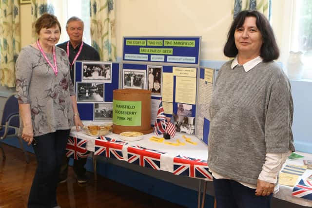 The chapel's minister, the Rev Maria Pap, with members Peter and Kath Faulkner by a display explaining Mansfield's link with a huge gooseberry pie.