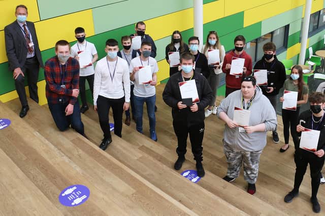 Some of the award-winning students, pictured with principal Andrew Cropley, far left, along with event organisers Reece Tomlinson and Owen Schofield, front, first and second left, and Ellie Graham and Katie Gray, back, first and second right.