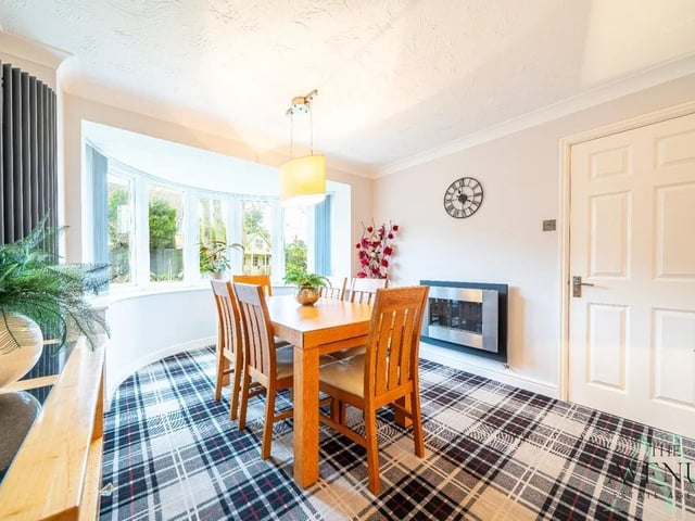 Next to the lounge is a third reception room currently used as a dining room.