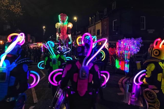 The drum troupe's truly artistic neon lights worked really well against the darkness of the night sky.