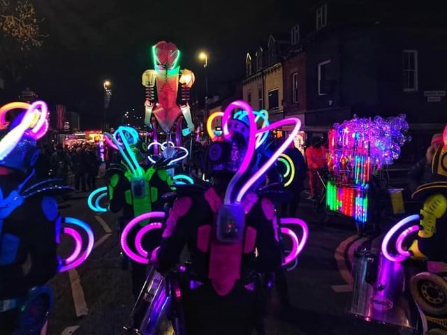 The drum troupe's truly artistic neon lights worked really well against the darkness of the night sky.