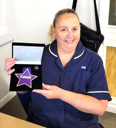 Tracey Gibson, District Nurse from Nottinghamshire Healthcare with her Cavell Star Award.