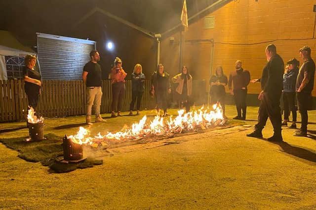 A fire walk held at Debdale Park Sports Club