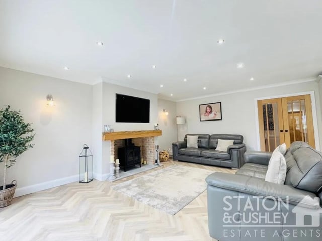 There is a cosy Stovax log fire creating a great central feature of the room.