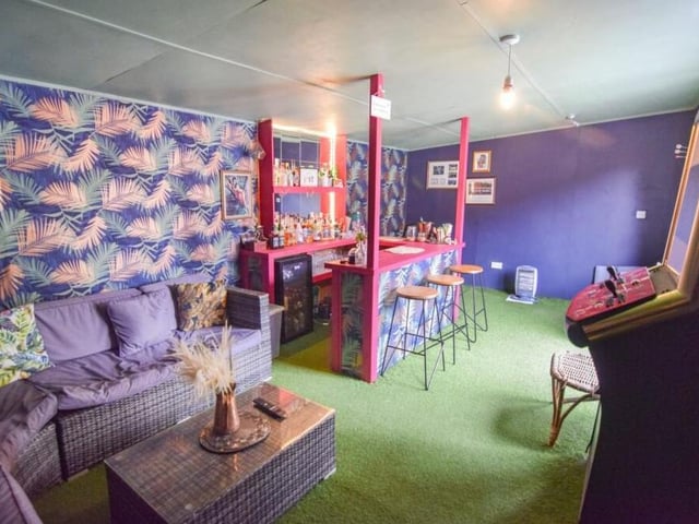 The 'pub shed' is deceptively spacious. There is room for a bar, comfortable seating, tables and stools and even a gaming machine.