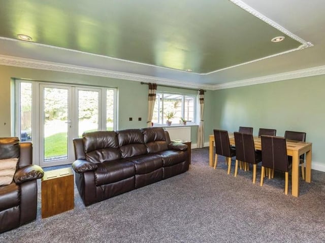 The lounge/diner features a set of French doors that give access to the back garden.