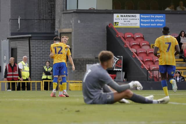 Davis Keillor-Dunn celebrates his brilliant winner at Grimsby.