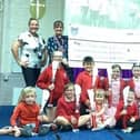 Anthony Bek Primary presenting their cheque for St Michael’s Church in Pleasley after the Colour Run