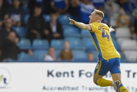Mansfield Town forward Davis Keillor-Dunn celebrates a goal. He was rated as Mansfield's best player.