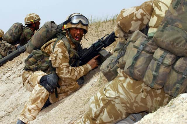 Soldiers in action on the frontline in a war-torn country abroad (PHOTO BY: Paul Jarvis/MOD/Getty Images)