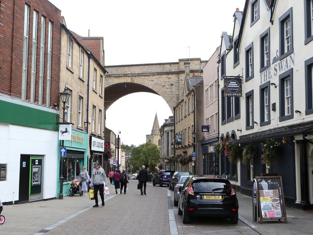 The Mansfield Town Centre Heritage Trail says: "Formerly known as Kirkgate, this is one of the oldest streets in Mansfield linking the church, the Moot Hall and the site of the old market place. Coaching inns provided rooms and refreshments for weary travellers and stabling for the horses. A tannery was established behind the Ram Public House in the 17th century which was still in business in the late 1800s. An inn and a number of cave houses were cut into the limestone cliffs which can be seen behind the modern shop fronts."