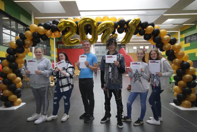 West Nottinghamshire College students with their results.