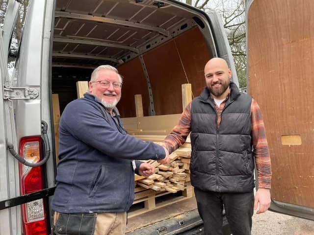 Chris Wynne (left), Trade Tutor at Portland College,  collecting wood offcuts from Kieran Percival.