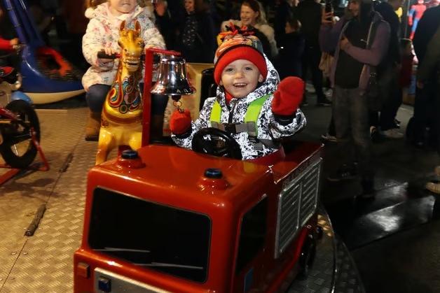 Little Joey Mayes lights up with excitement as he gets to ring the bell on the fire engine back in 2017