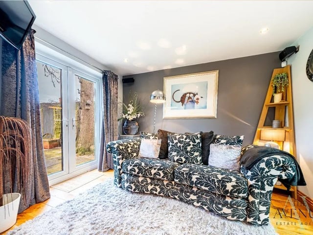The snug features French Doors leading out onto the garden.