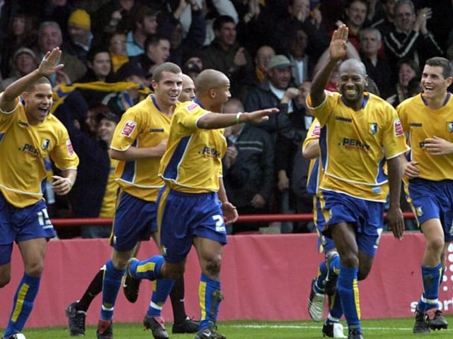 Simon Brown celebrates scoring in 2005.
