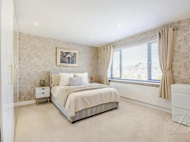 One of four well-proportioned bedrooms.