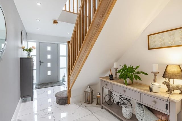 As you step through the front door at the Rockcliffe Grange property, you are greeted by this welcoming entrance hall, with its underfloor heating, seven ceiling spotlights and stairs to the first-floor landing.