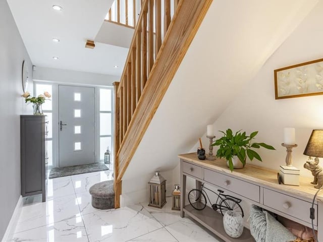 As you step through the front door at the Rockcliffe Grange property, you are greeted by this welcoming entrance hall, with its underfloor heating, seven ceiling spotlights and stairs to the first-floor landing.