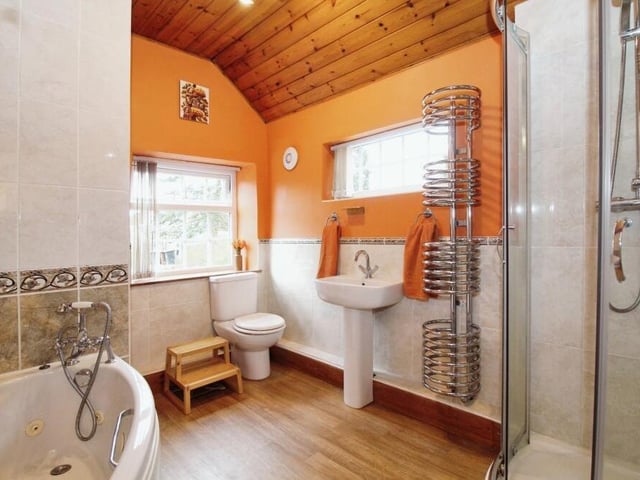 There are two modern family bathrooms or shower rooms at the Annesley Woodhouse property -- one downstairs and one upstairs. Here is one of them, offering both convenience and style.