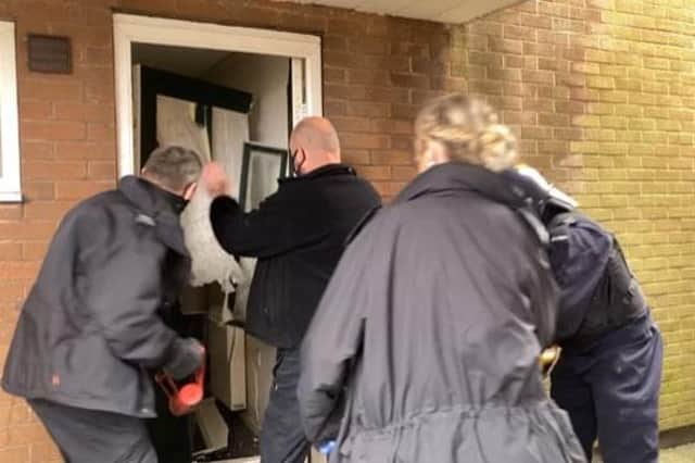 Three suspects were arrested and drugs were seized as police carried out coordinated raids at a complex of flats in Sutton. Photo: Nottinghamshire Police.
