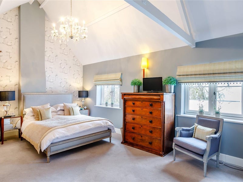 An impressive, fully vaulted room with a double-fronted view out to the rear aspect.