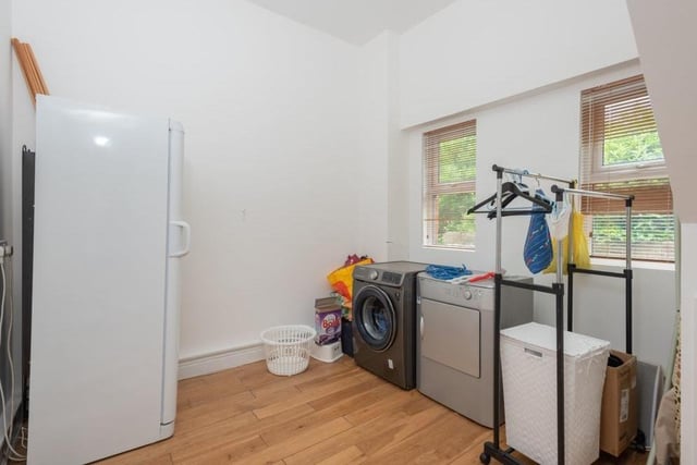 A pantry and this utility room, with space for a washing machine, are bonus features of the ground floor of the property.