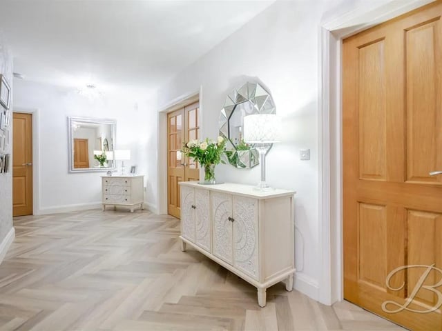 As you step inside, you are greeted by an inviting and larger than average reception hallway that sets the tone for the rest of the home.
