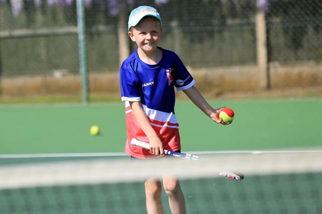 A youngster takes part in the Tennis for Kids initiative at Mansfield Lawn Tennis Club in 2018.