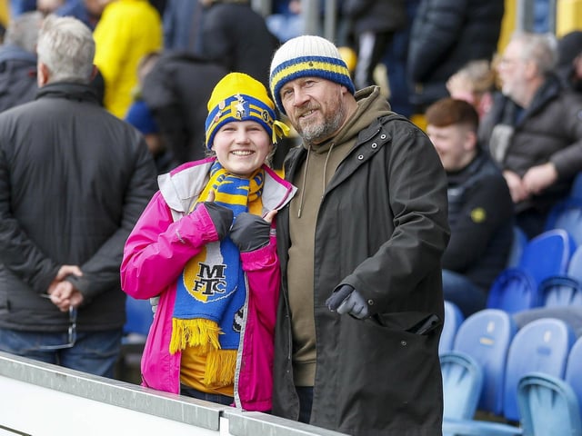 Mansfield Town fans enjoy the win over Gillingham on 11th Feb 2023.