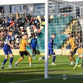 George Maris turns home the winner during the Sky Bet League 2 match against Newport County AFC at Rodney Parade 02 March 2024.Photo credit : Chris & Jeanette Holloway / The Bigger Picture.media