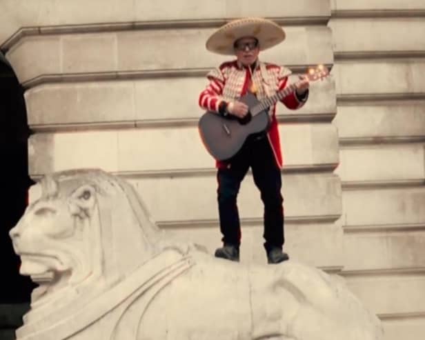 A still image taken from Rob Saunders' music video. Here is Rob in Nottingham's Old Market Square.