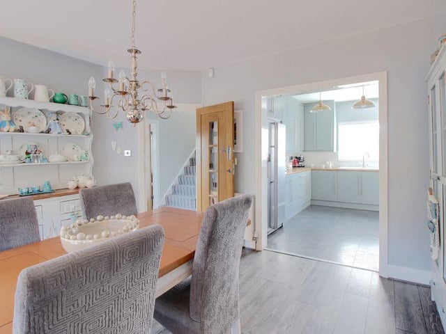 Another look at the cosy and convenient dining area, which adjoins the kitchen in the background.