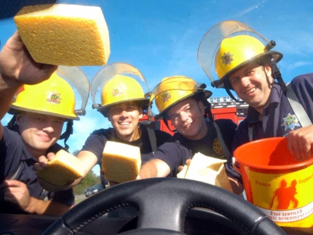 Fire fighters at Ashfield Fire Station washed cars in 2006 to raise money for the Benevolent fund - from left, Richard Bunting, Gary Wilson, Marc Jones, Stef Cheetham.