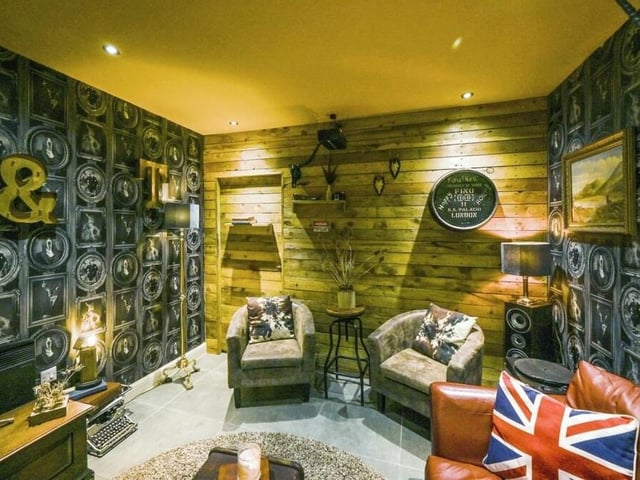 Part of the garage has been converted into this amazing extra living space by the current owners. It is fitted with power and lighting, fully insulated and oh-so-cosy.