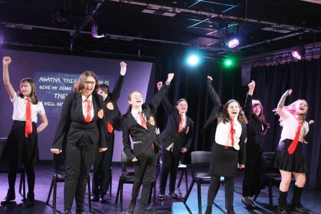 Students performing Matilda at Shirebrook Academy.