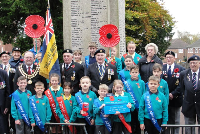 Pupils from Kingsway Primary School join members of the Royal British Legion, appeal organiser Sue Evans and Councillor David Griffiths in 2016.